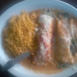 Vegetarian enchilada and burrito! Con Arroz! Yum!