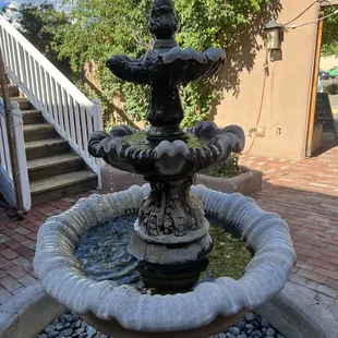 Beautiful fountain in the center of the outdoor dining courtyard area.