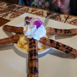Churro and vanilla ice cream