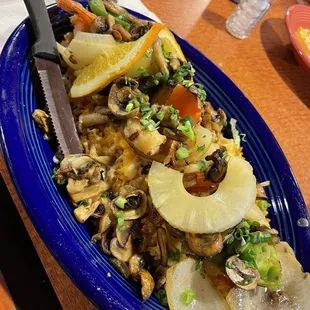 Beautifully massive plate of Shrimp Banderillas, extra cheese and mushrooms.