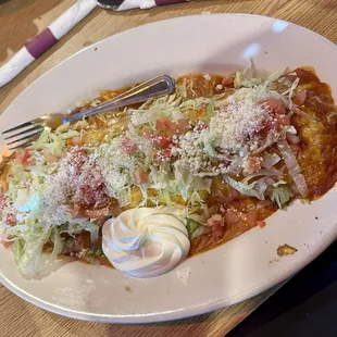 Carnitas Giant Burrito. I placed a fork so you can reference the size of the burrito.