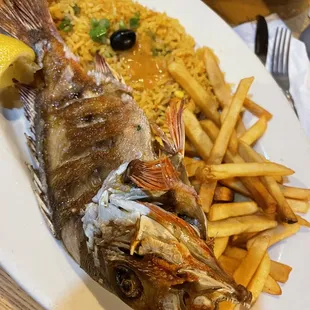 Fried snapper, a favorite of mine and worth fighting through the bones.