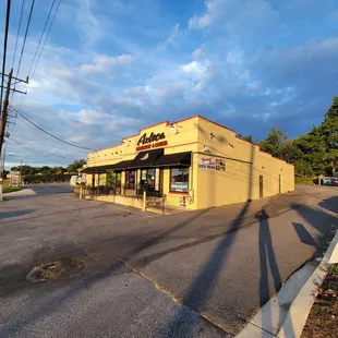 The driveway goes to a parking lot in the back. Slender Man is taking a photo :0 :)