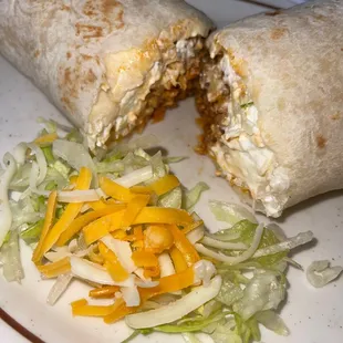 Egg and Chorizo burrito, no rice or beans, with onion and sour cream and little salsa heat.