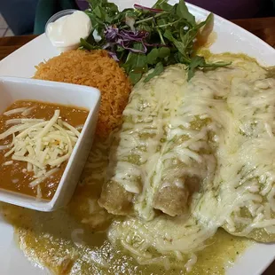 Chicken 2. Enchiladas Suiza with beans and rice
