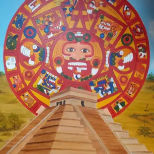 a painting of a sun wheel