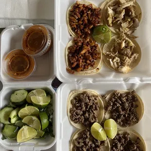 2 spicy pork, 2 chicken, 4 steak street tacos.  Onions cilantro, lime, cucumbers &amp; salsa on the side.
