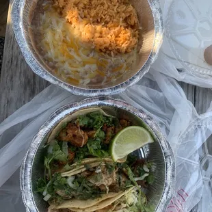 Combo plate (3 tacos, rice &amp; beans).