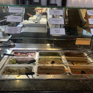 Several tasty options of salsa at their salsa bar.