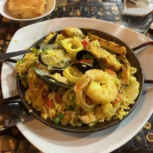 The paella packed with chicken and sea food served HOT