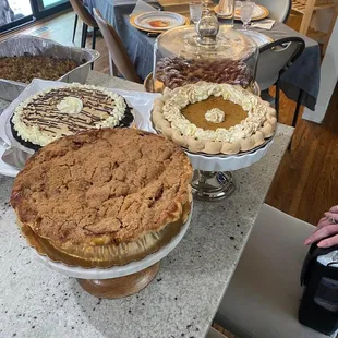 Apple crumb pie in front.