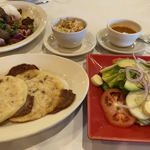 Pupusas, chips, salsa, side salad.