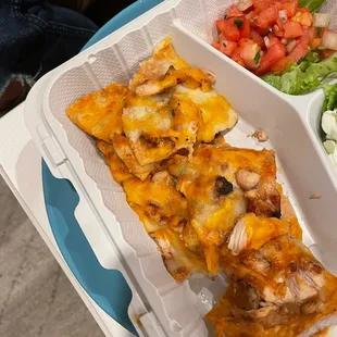 a meal in a styrofoam container