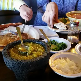 Fresh green salsa and taco fixens