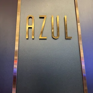 the name of the company on the wall