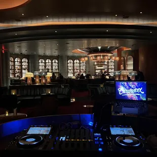 dj equipment in a dimly lit bar