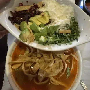 Sopa Azteca con Pollo toppings for the soup. Normally, come with chopped onions, I asked requested them off.