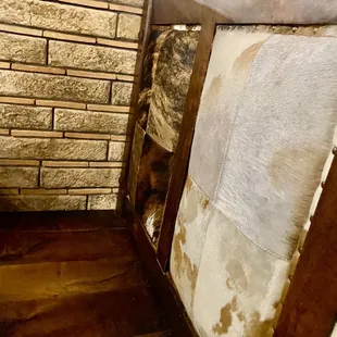 Booth with cowhide back