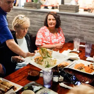 a man serving food