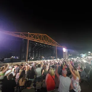 Stage lights off, cellphone flashlights on
