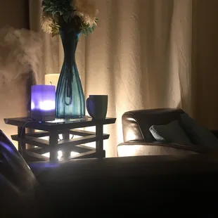 a vase of flowers on a coffee table