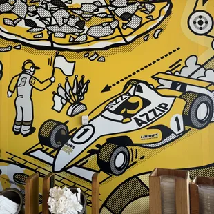 a pizza with a racing car on it