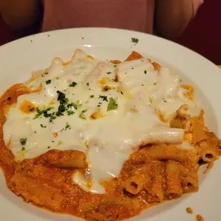 a plate of pasta and cheese