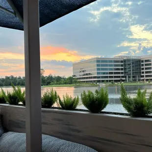 View of Lake Woodlands at outdoor seating