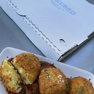 Arancini. 3 for $15. Crispy crust and creamy rice, but lacking flavor. And a Margherita Pizza.