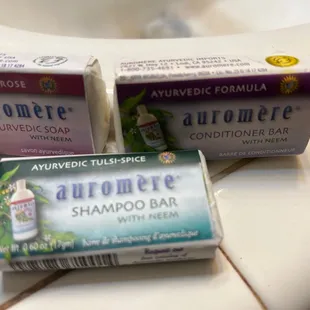 three soap bars on a bathroom counter