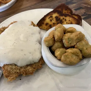 Chicken fried steak with a side of fried okra