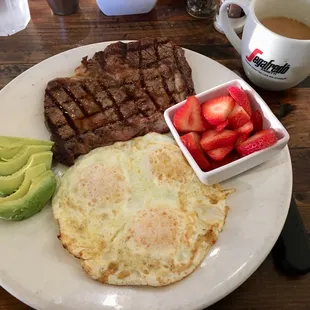 Steak and eggs perfectly cooked and served with care