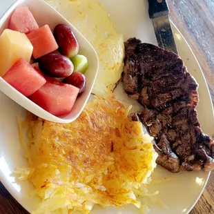 8 oz ribeye, hashbrowns, two eggs over medium and fruit. Taken: 01/20/23