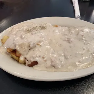 One biscuit with sausage gravy and home fried potatoes.  You can&apos;t go wrong