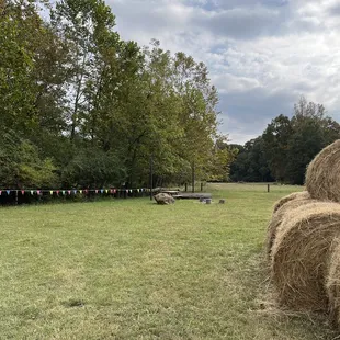 Barrels of hay + slide and open space