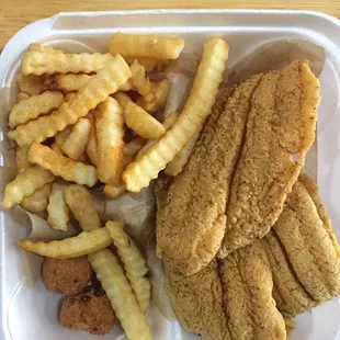 Whiting dinner with fries and hush puppies