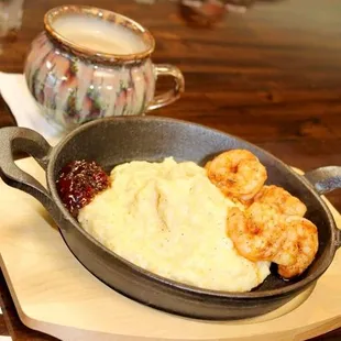 Shrimp and grits with a hot latte