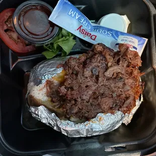 Chopped brisket baked potato. I think it was $13.99, March 2023.