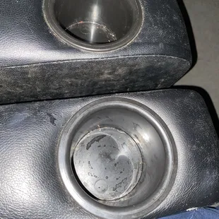 Filthy armrests and cup holders