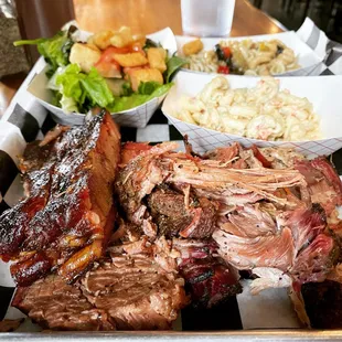 Ribs, pulled pork, brisket, salad, macaroni salad and pasta salad (All you can eat option)