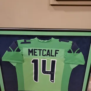 DK Metcalf autographed framed jersey.  Go Hawks!