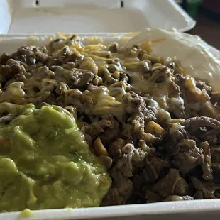 Carne Asada Fries with Guacamole and Sour Cream