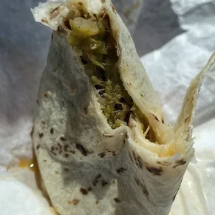 Green chili shredded pork with some heat. Delicious!