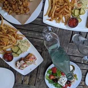 Lobster rolls, heirloom tomato salad with barrata, fried clams, with good company