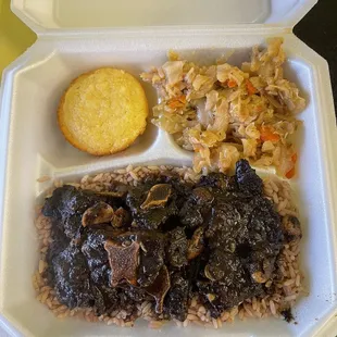 Oxtails with cabbage and cornbread