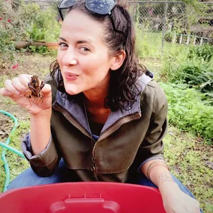 a woman eating a crab