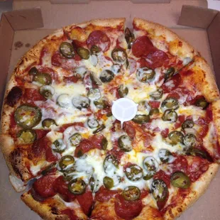 Pepperoni &amp; jalapeño pizza with extra cheese!