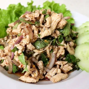 Chicken Laap- minced chicken tossed with green onions, red onions, cilantro, anchovy sauce, fish sauce, lime juice and house spices