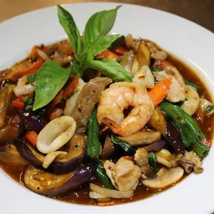 Chef Special- shrimp, beef, calamari, chicken, eggplants, green beans, mushrooms, onions, bell peppers, and fresh basil stir fried (Spicy)