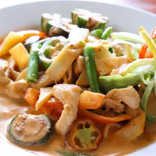 Kheang Phet- red curry sautéed with creamy coconut milk, green beans, bamboo shoots, thai basil, jalapeños, Thai eggplants, and bell peppers